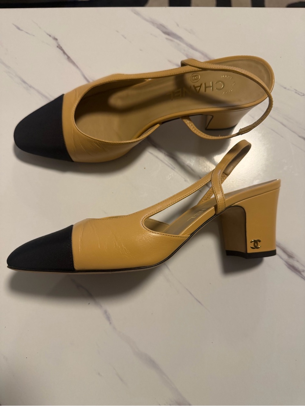 CHANEL Yellow Leather Slingback Pumps with Black Cap Toe